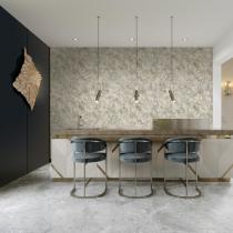 A chic modern kitchen with a designer beige front with gold acce