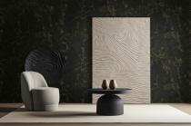 Grey wall panels and a black side table in minimalistic interior